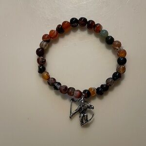 Precious handcrafted stretch agate bracelet with sterling silver skier charm